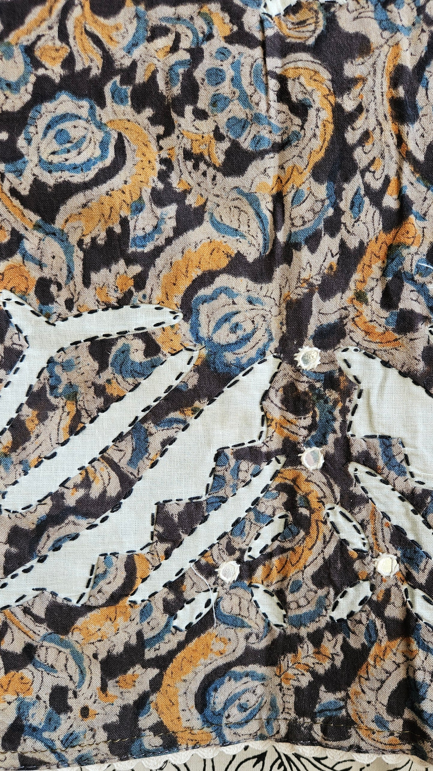 Pure cotton black,mustardand blue intricately designed kalamkari suit with applique work on ghera