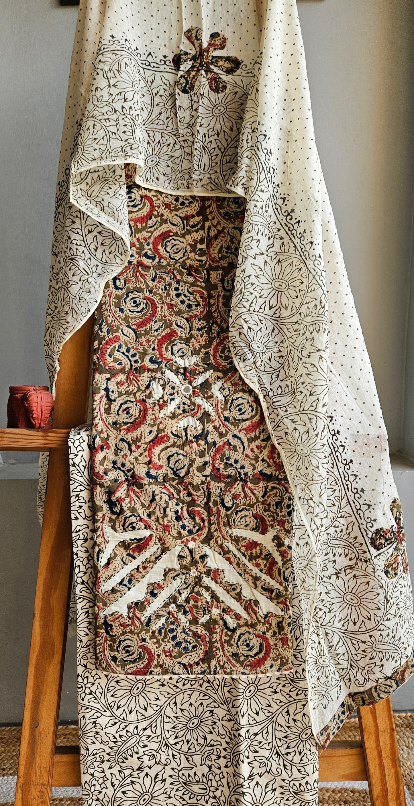 Pure cotton rust,green'n'blue intricately designed kalamkari suit with applique work on ghera