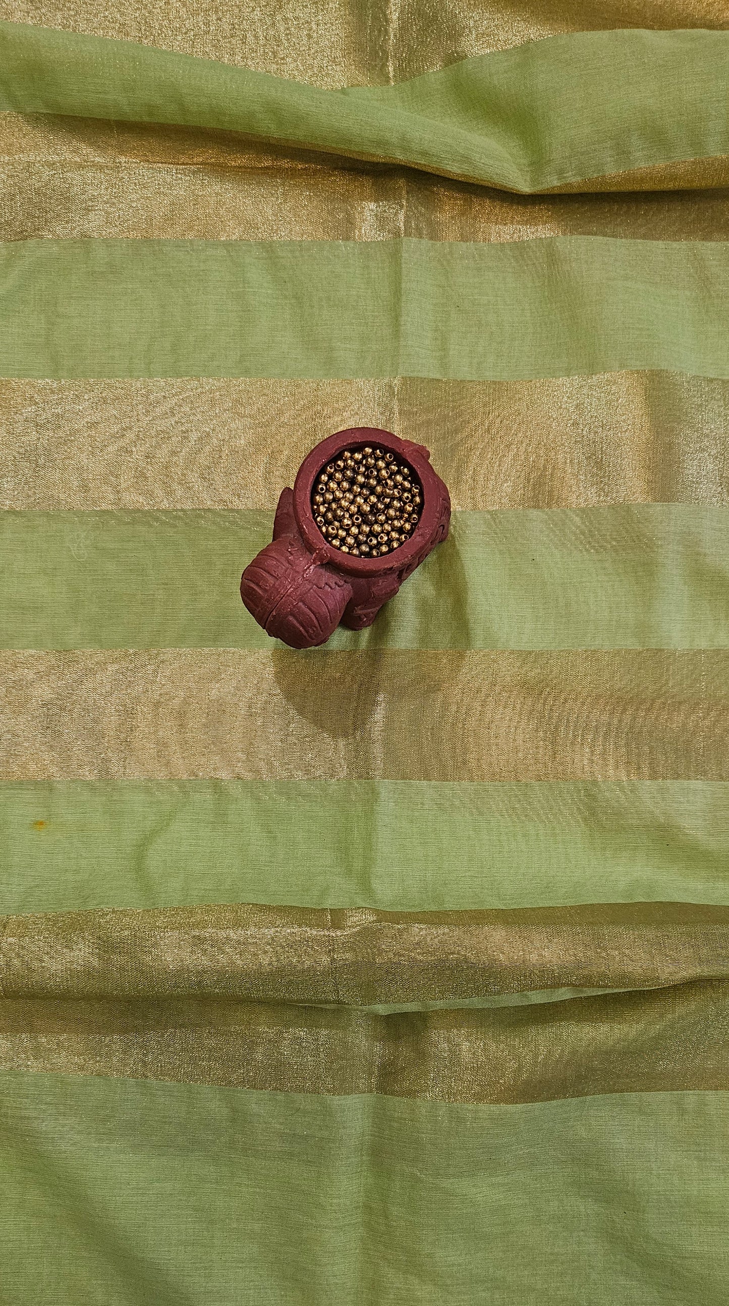 Green'n'gold mul chanderi suit with striped dupatta
