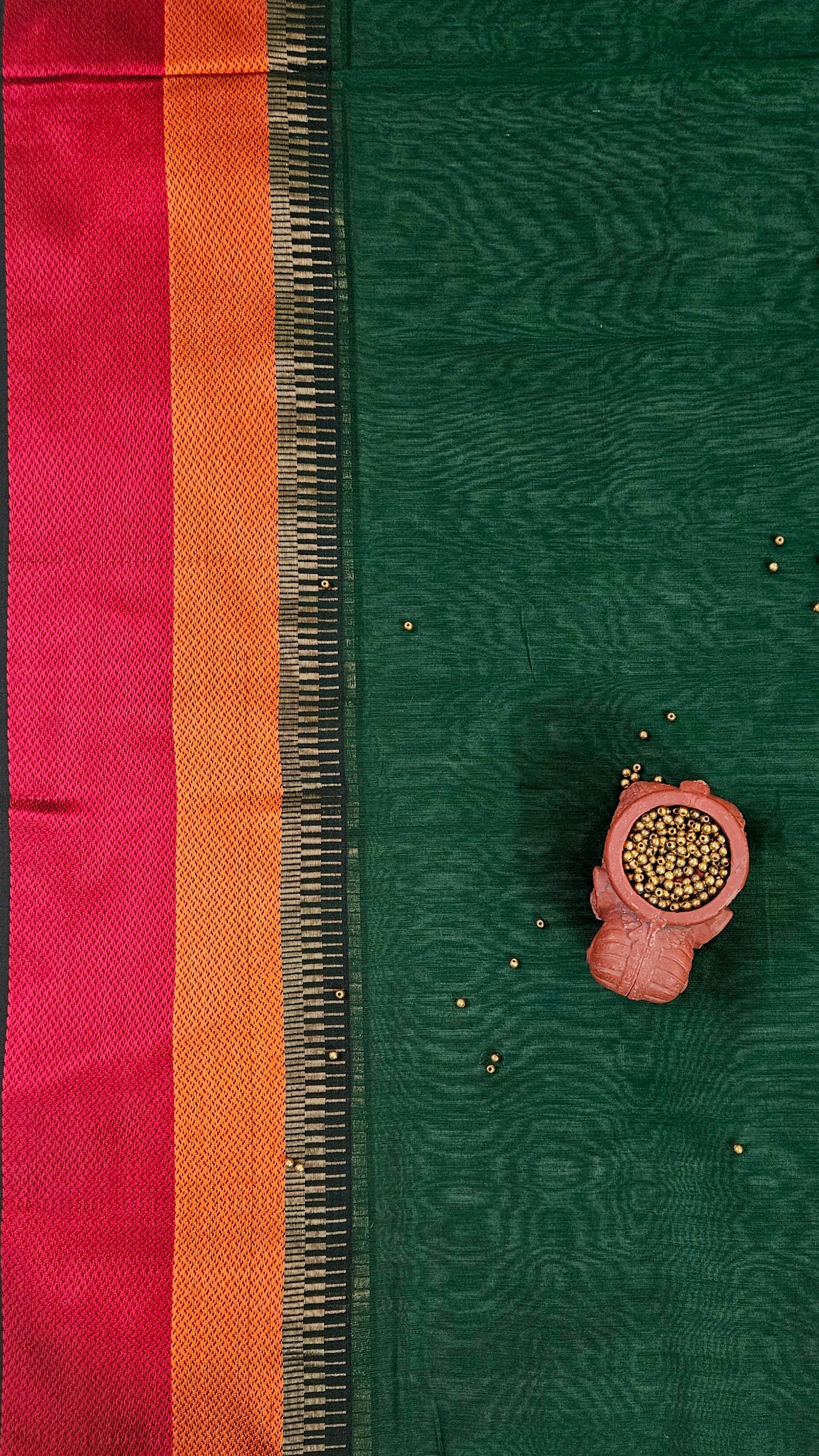 Dark green handloom maheshwari suit with resham borders