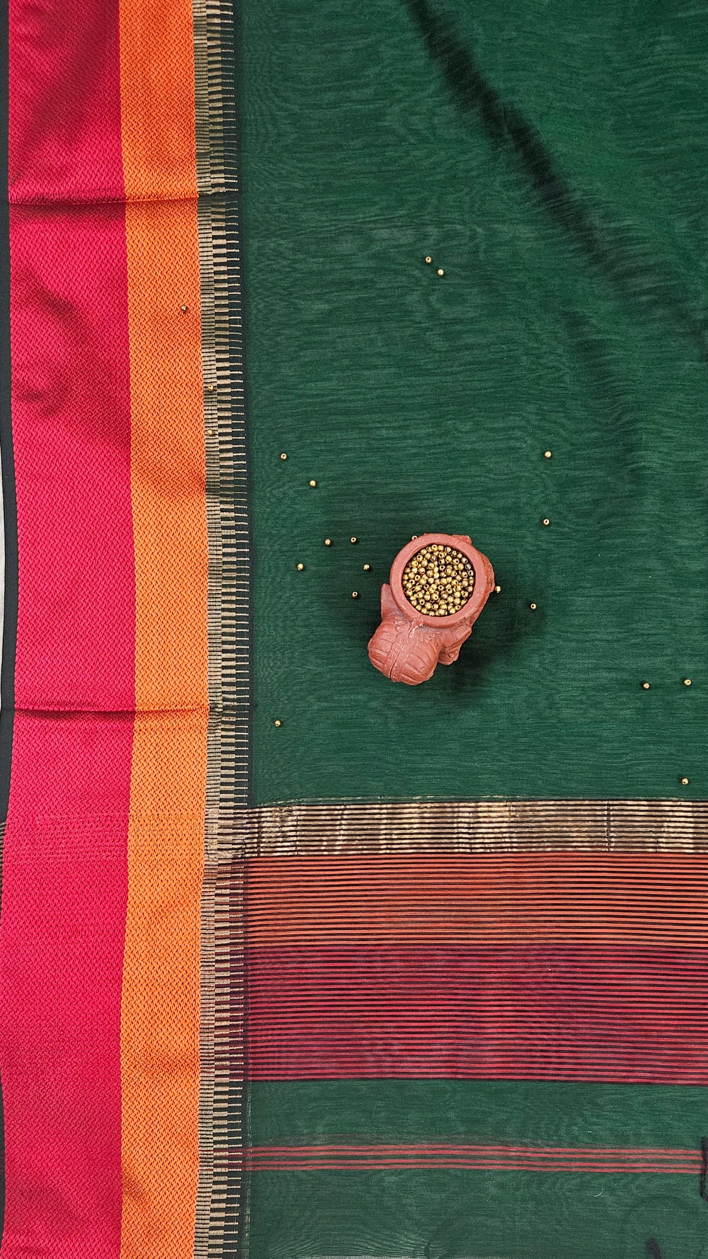 Dark green handloom maheshwari suit with resham borders
