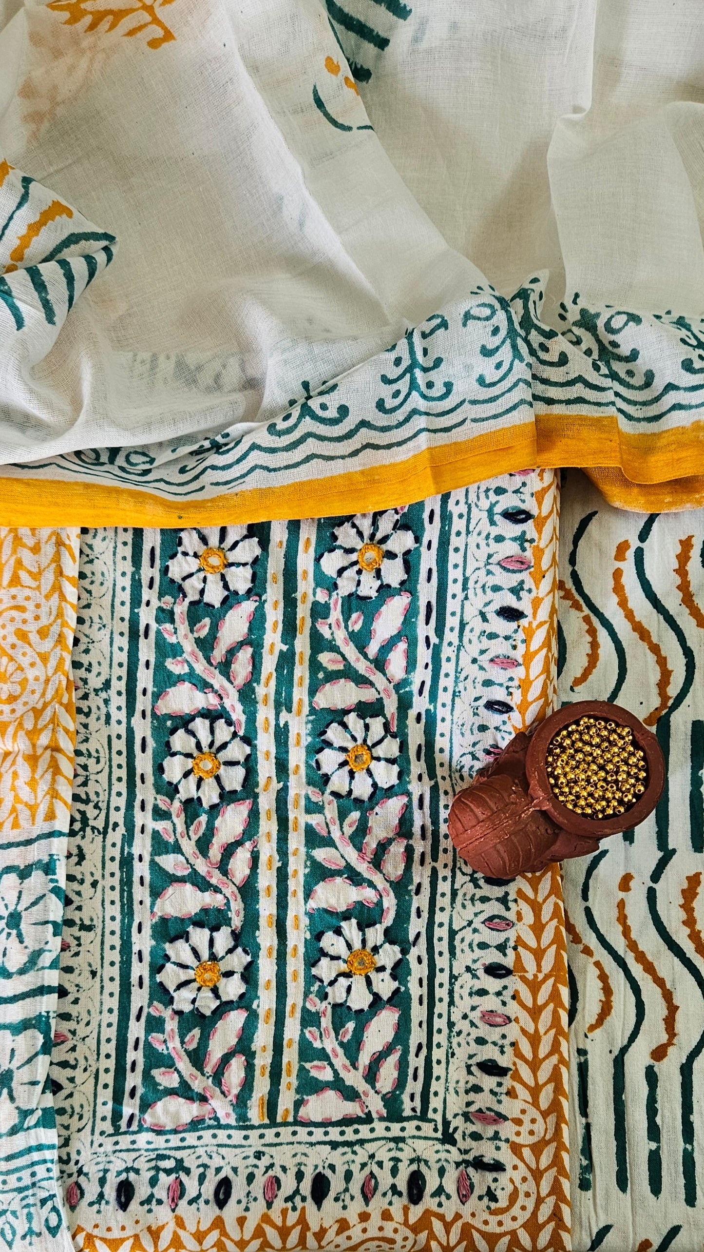 Green’n’mustard hand embroidered yoke Baroda print cotton suit